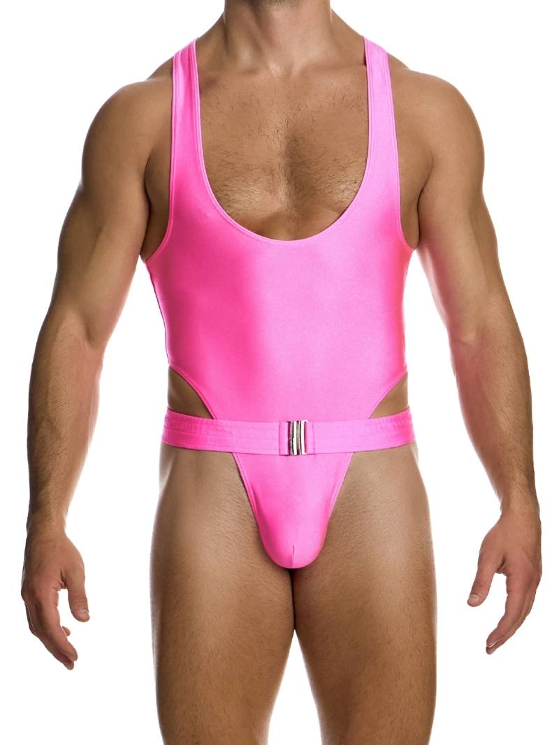 A male model wearing a high-waisted, sleeveless white one-piece thong swimsuit with a Removable and adjustable belt, and nickel-free front fastening.