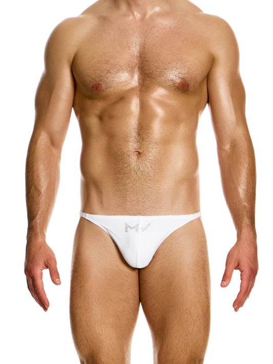 This image features the Modus Vivendi Diamonds Swim Thong, modeled in a striking white color. The swim thong showcases a sleek, low-rise design with a high-cut leg, emphasizing a stylish and contemporary look.