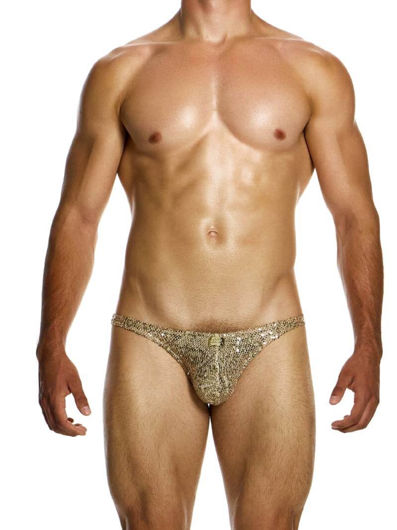 A model wearing a gold sequin-covered Modus Vivendi Harem low-cut brief with an elasticated waist and high-cut legs.