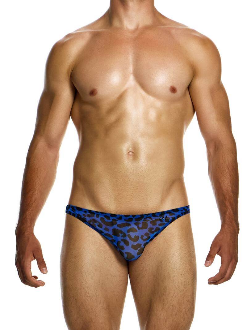 This image displays the MODUS VIVENDI Leopard Low Cut Brief, designed with a striking sheer mesh leopard print fabric and accented with the brand's shiny MV logo. The brief features a super low rise waist and high cut legs, creating a bold and modern silhouette.
