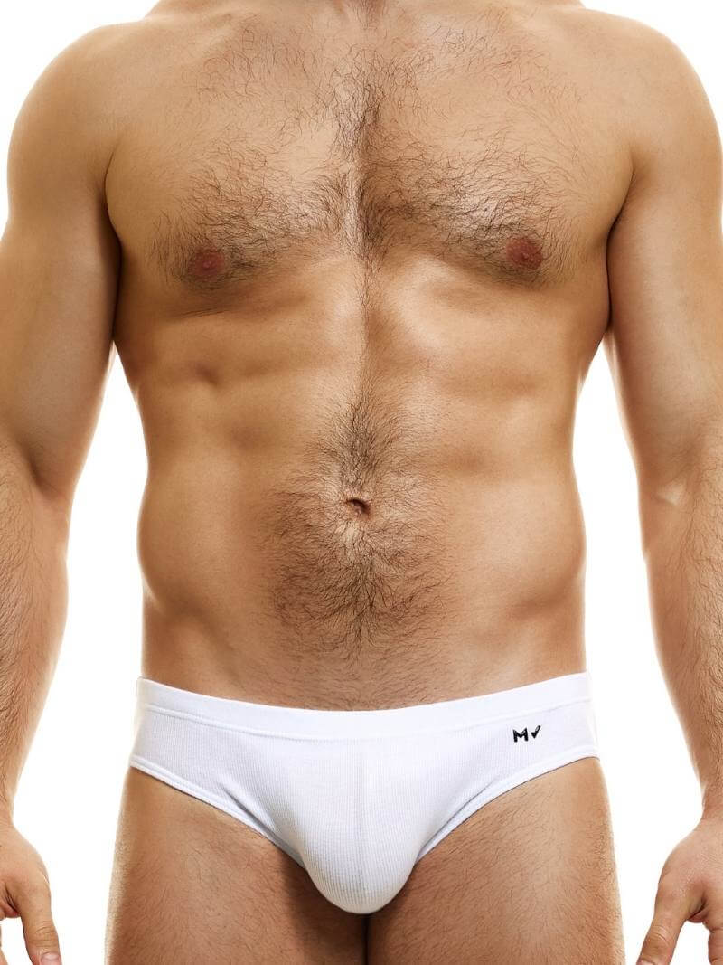 This image displays the MODUS VIVENDI Peace Classic Brief, modeled in a striking neon blue color. The briefs are designed with a low-rise waistband that ensures a modern and comfortable fit.