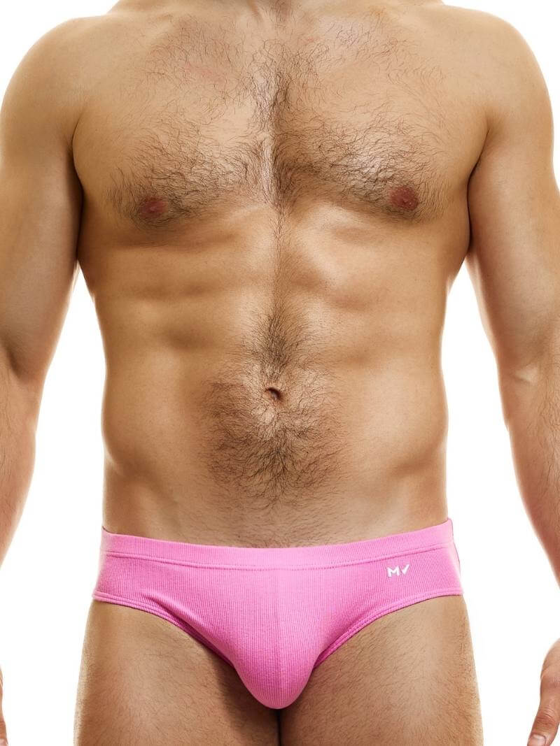 This image displays the MODUS VIVENDI Peace Classic Brief, modeled in a striking neon blue color. The briefs are designed with a low-rise waistband that ensures a modern and comfortable fit.
