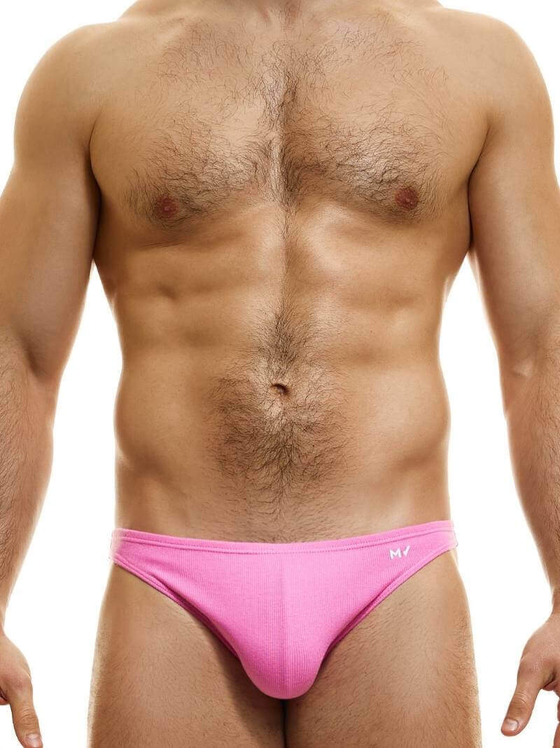 This image features the MODUS VIVENDI Peace low-cut mini brief, showcased in a striking neon blue color. The brief is designed with a super low-rise elastic waist and high-cut legs, creating a modern and flattering silhouette.