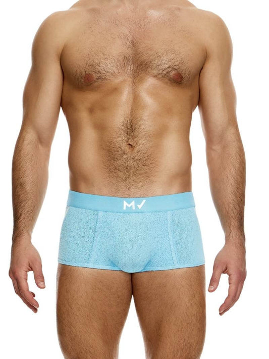 A model wearing a plain knit boxer brief with a wide elastic waistband.