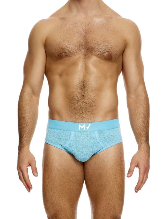 This image features the MODUS VIVENDI Plain Knit Classic Brief in a vibrant pink color. The brief showcases a fine knit texture made from a blend of polyester and cotton, ensuring both comfort and durability.