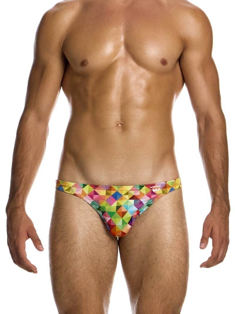 This image features the MODUS VIVENDI Geometric Rainbow Low-Cut Swimwear Bikini, designed with a bold and colorful geometric pattern in shades of yellow, pink, red, and blue. The swimwear briefs are crafted from a quick-drying, elasticated polyester made from recycled plastic bottles, offering both comfort and environmental sustainability.