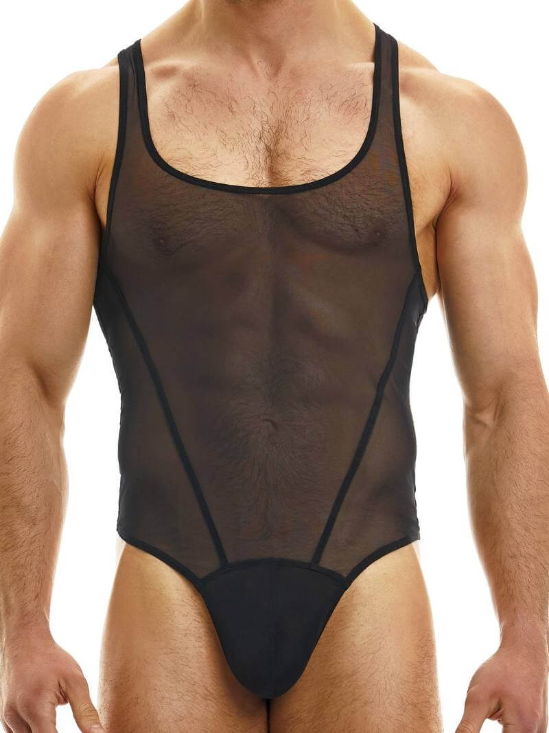 A male model wearing a black sheer muslin bodysuit with a thong rear and contoured pouch.