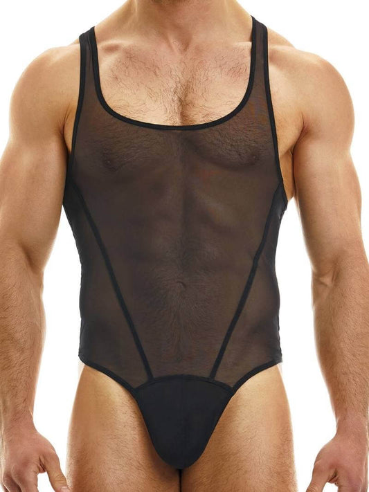 A male model wearing a black sheer muslin bodysuit with a thong rear and contoured pouch.