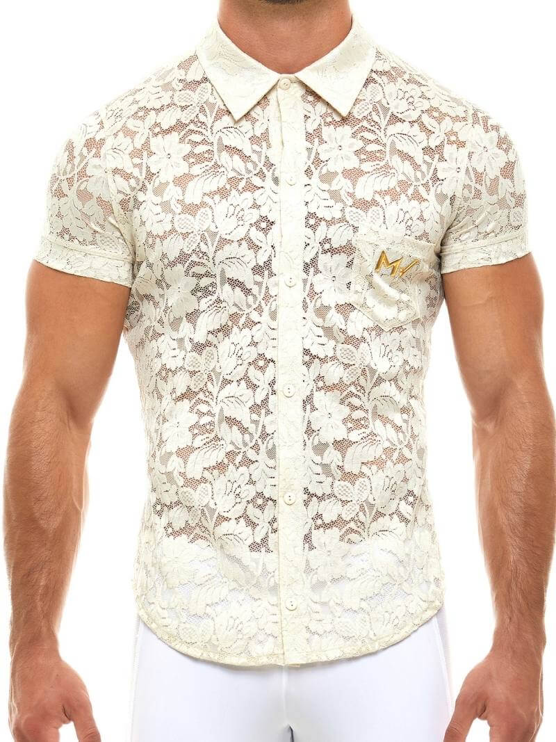 Man wearing a white lace shirt with a collar on a white background