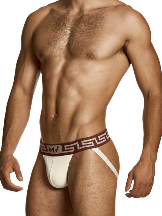 Man wearing a white thong with a red waistband on a white background
