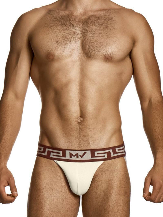 Man wearing a white thong with a red and white waistband on a white background