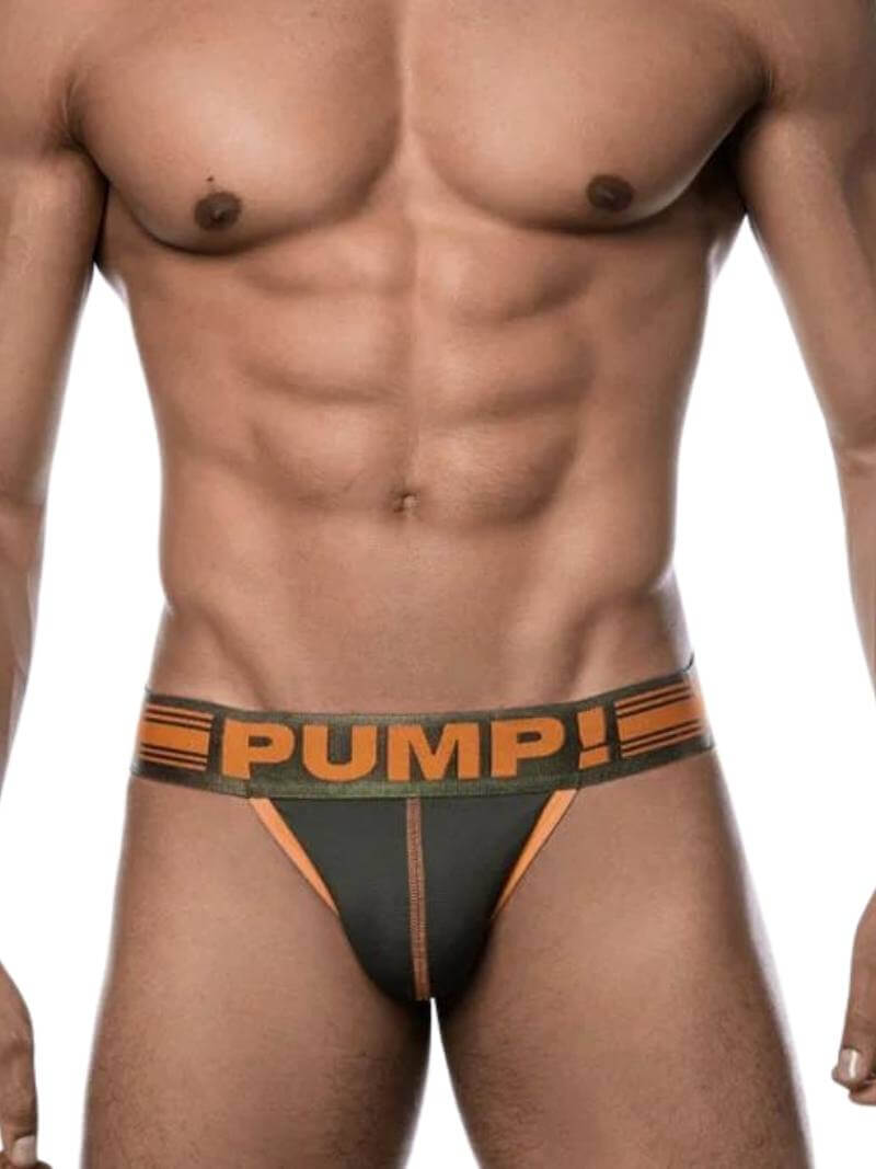 A model wearing an army green and orange striped micro-mesh jockstrap with the brand name 'PUMP!' on the waistband.