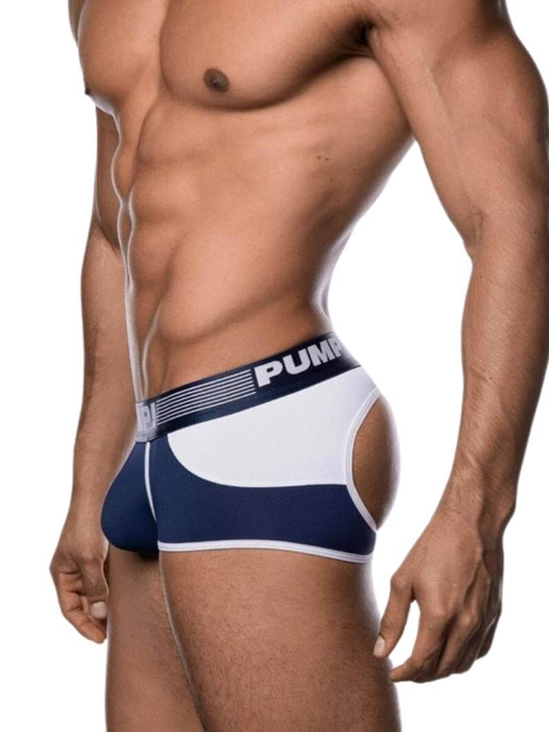 A model wearing navy and white striped PUMP underwear with a contoured pouch and a visible brand waistband.