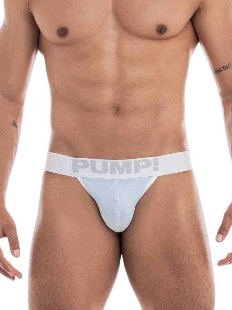 A model wearing a PUMP Underwear Milkshake Cotton Jockstrap in a pastel green color with white stitching and a elasticated waistband with PUMP! branding.