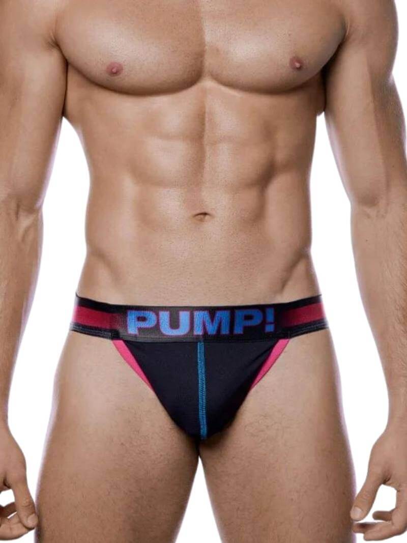 This image features the PUMP Underwear Play Tanga Brief, part of the PUMP! Play collection. The brief showcases a sleek, black body with vibrant colored trims and a boldly striped, branded waistband that reads "PUMP!" in eye-catching lettering.