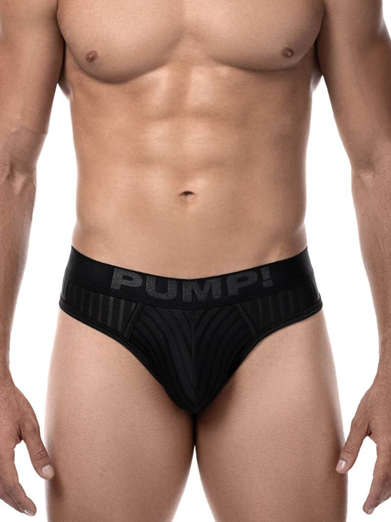 This image features the PUMP! Whisper Thong, showcasing a minimalist design ideal for nighttime elegance. The thong is presented in a sleek black color, emphasizing a subtle yet sophisticated aesthetic.