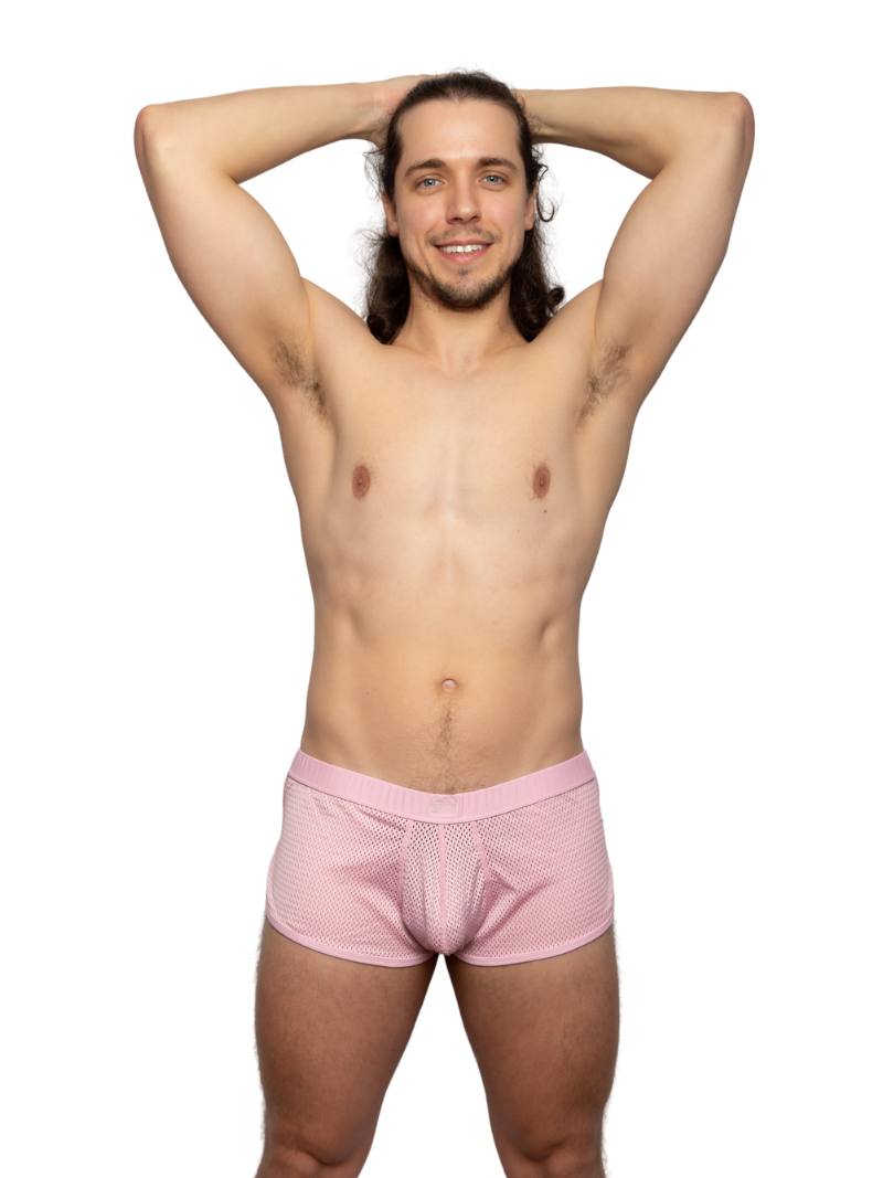 Man wearing pink underwear on a white background