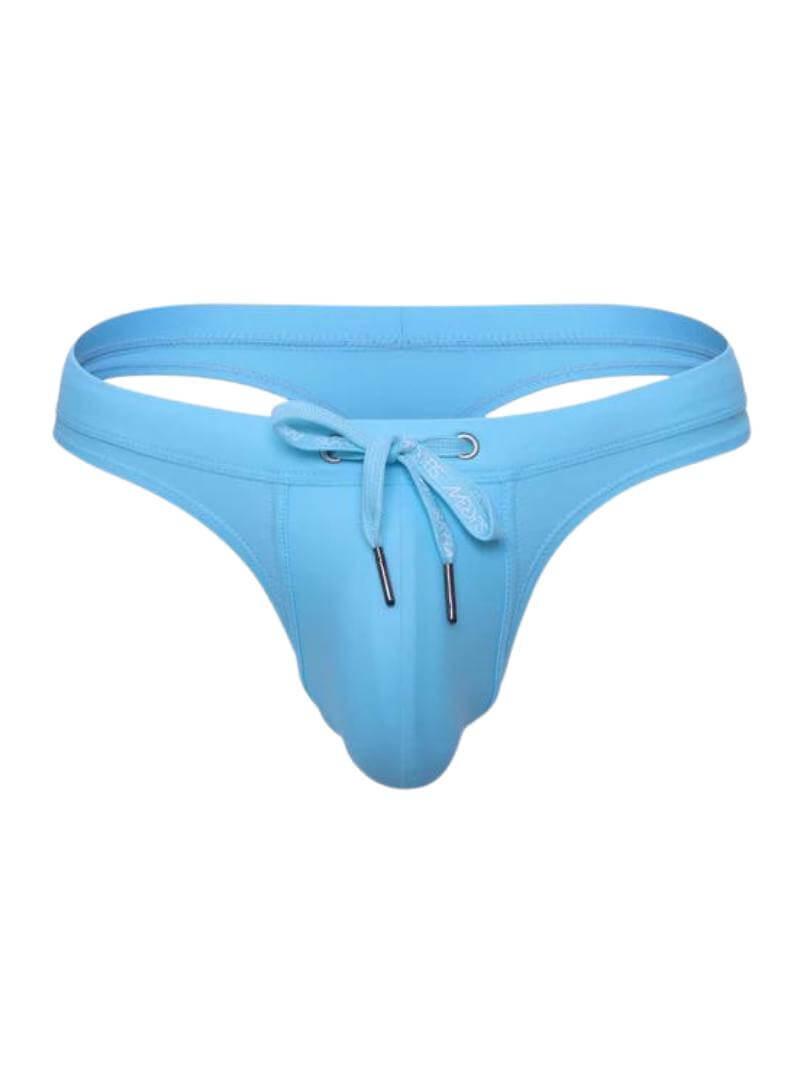 A blue SUKREW Torrent swimming thong with a matching waistband, branded drawstrings, and a contoured pouch.