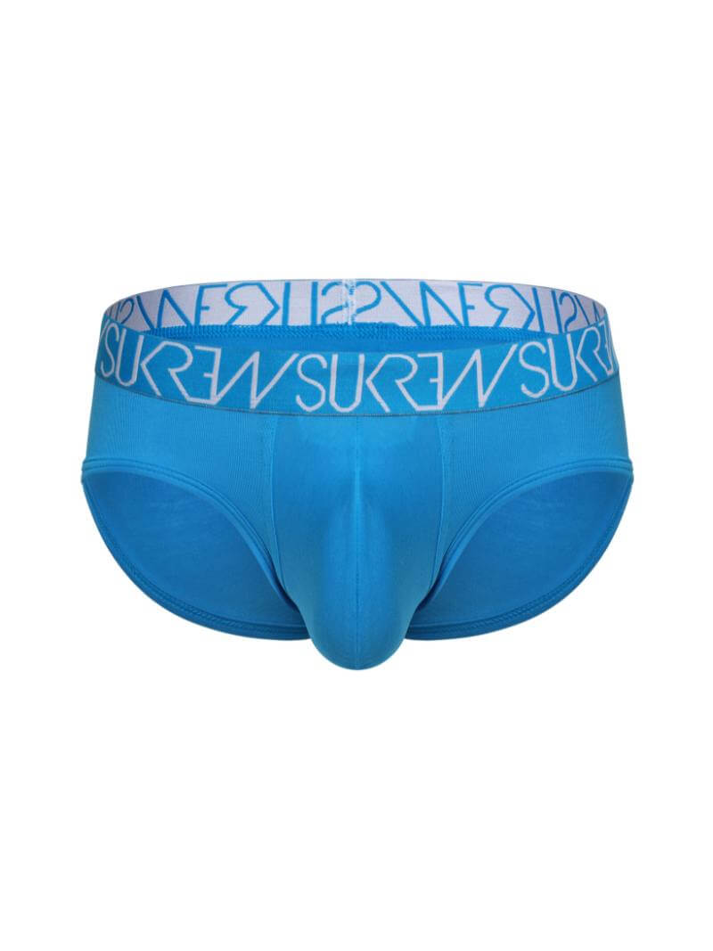 This image displays the SUKREW Urban Cotton Apex Brief in a vibrant blue color. The brief features a stylish and comfortable design with a blue SUKREW branded waistband that adds a modern touch.