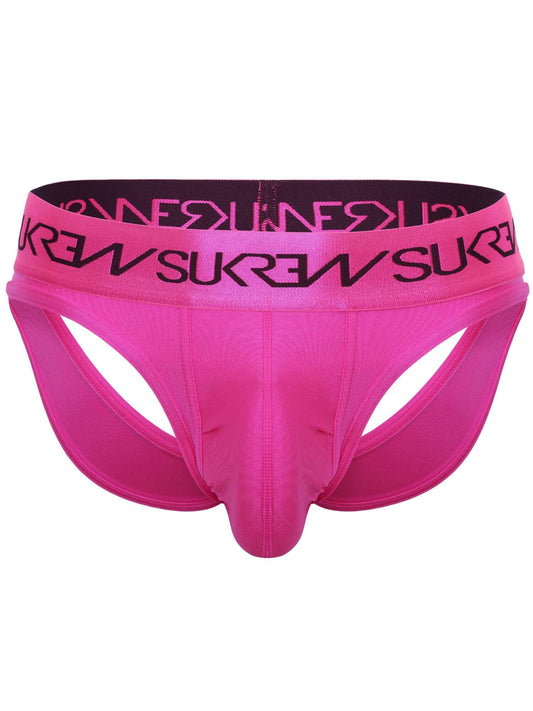 Bright pink men's jockstrap underwear with a wide black elastic waistband featuring the brand name 'SUKREW' printed repeatedly in black.