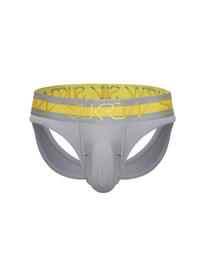A black SUKREW Highlight jock thong with a contrasting green waistband and signature white branding on the leg. The underwear features a large pouch and contoured front.