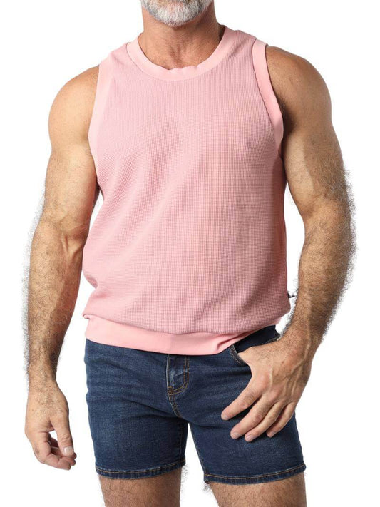 A male model wearing a black sleeveless knitted tank top with a round neck, branded with Timoteo on the side.