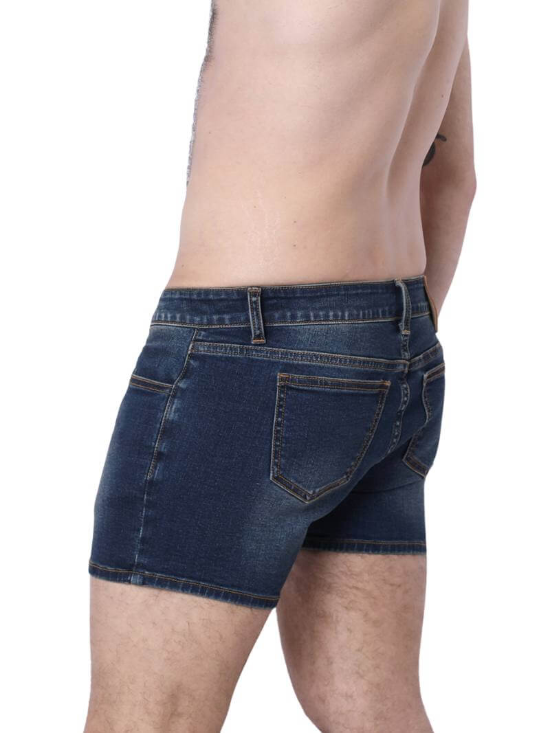 A pair of denim booty shorts with a low-rise waist and a 4-inch inseam, featuring a zipper fly, button fastening, belt loops, and four pockets. The shorts are blue with contrast stitching, and there is a leather branded patch on the back.