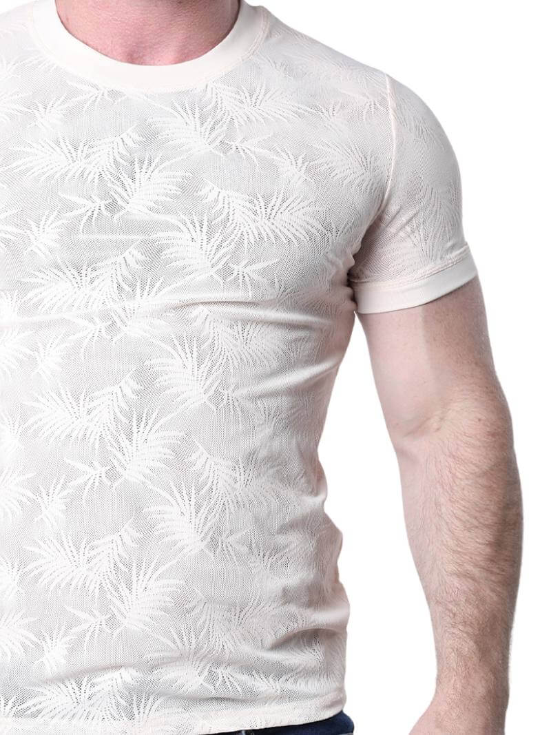 White textured t-shirt worn by a person on a white background