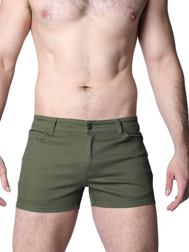 Green shorts worn by a person on a white background