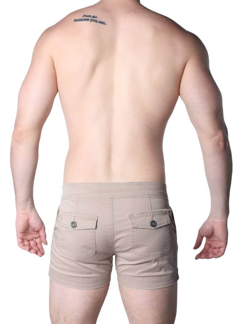Man wearing beige shorts on a white background