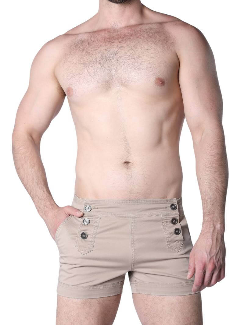 Man wearing black boxer shorts with buttons on a white background