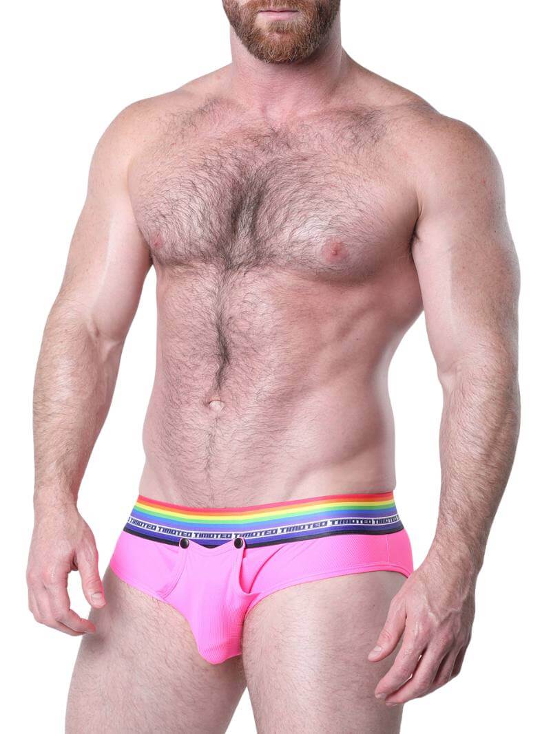 Man wearing pink underwear with rainbow waistband on a white background