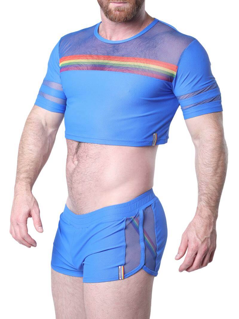 Man wearing a blue athletic outfit with mesh panels and rainbow stripes on a white background