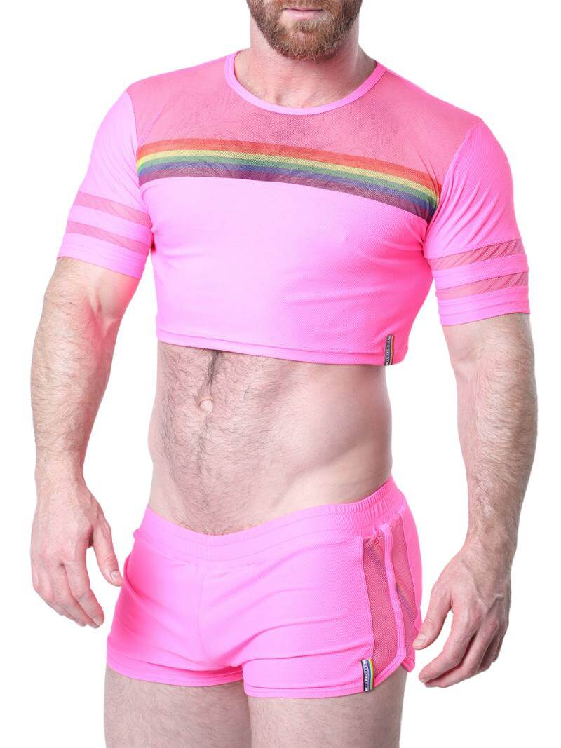 Man wearing a pink athletic outfit with rainbow stripes on a white background