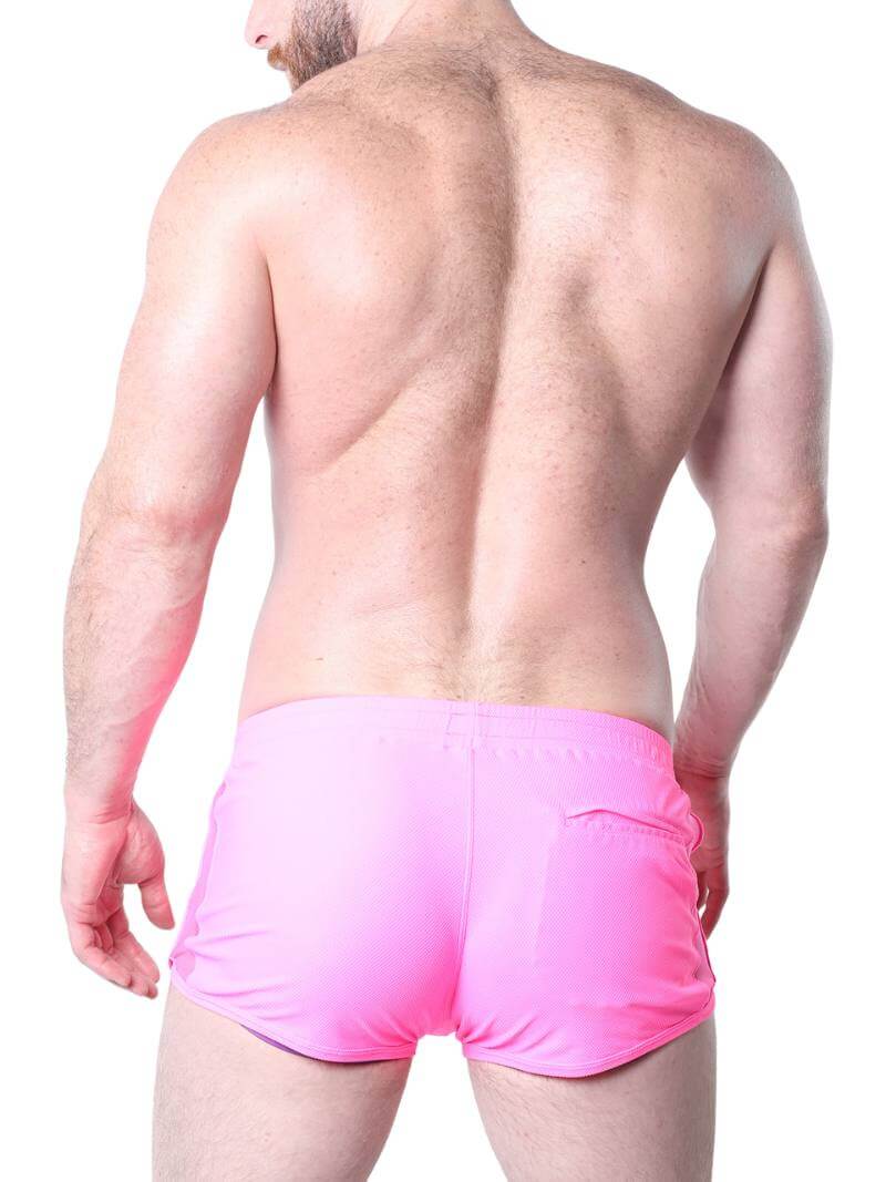 Man wearing pink underwear with a white background