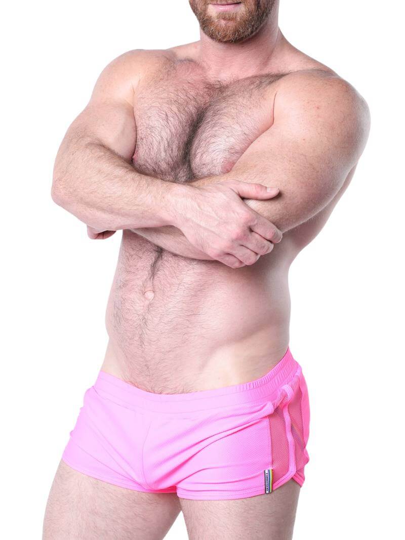 Man wearing pink underwear with a white background