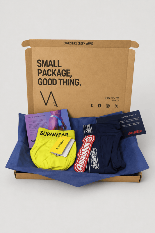 An example of the VA Club men's underwear subscription box service by VOCLA with two underwear products and product cards in a branded cardboard box