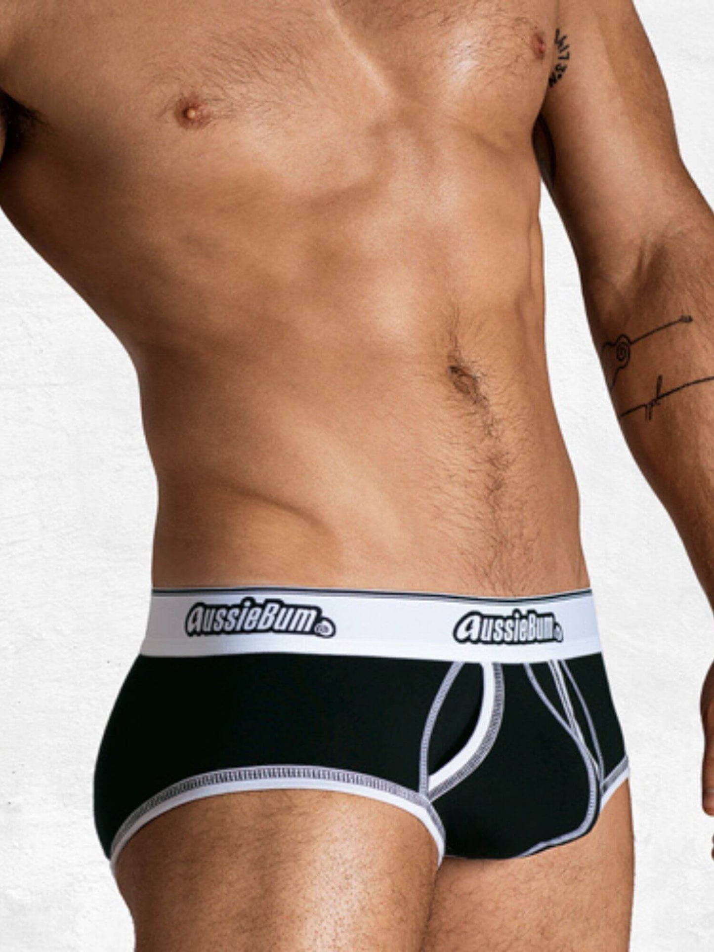 Black underwear with white waistband featuring 'AussieBum' brand on a plain background