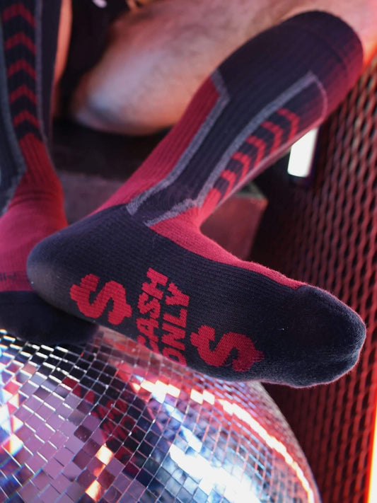 Black sock with red text on a disco ball