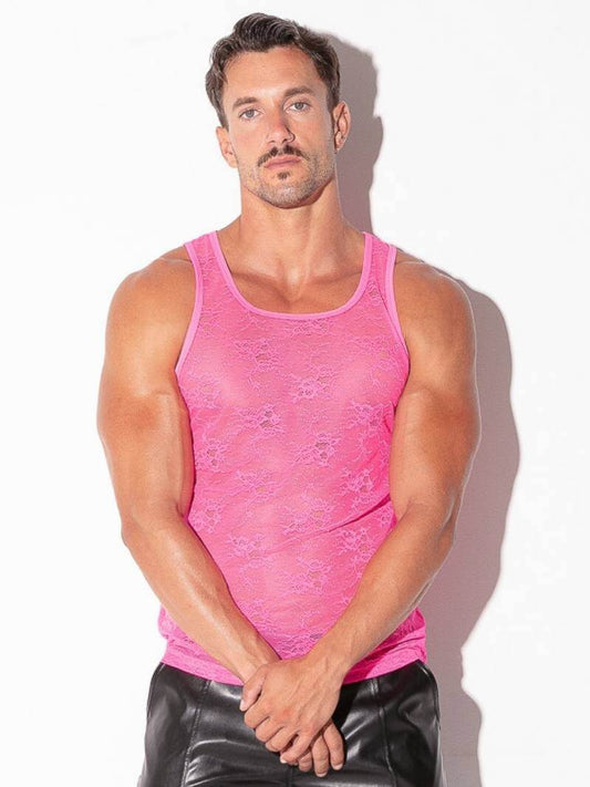 Man wearing a pink tank top against a white background