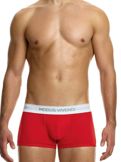This image displays the MODUS VIVENDI Staple Boxer in a striking turquoise color, emphasizing its design features and fit. The boxer briefs are crafted from an eco-friendly cotton blend, including recycled yarns, supporting both sustainability and comfort.