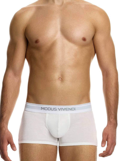 This image displays the MODUS VIVENDI Staple Boxer in a striking turquoise color, emphasizing its design features and fit. The boxer briefs are crafted from an eco-friendly cotton blend, including recycled yarns, supporting both sustainability and comfort.
