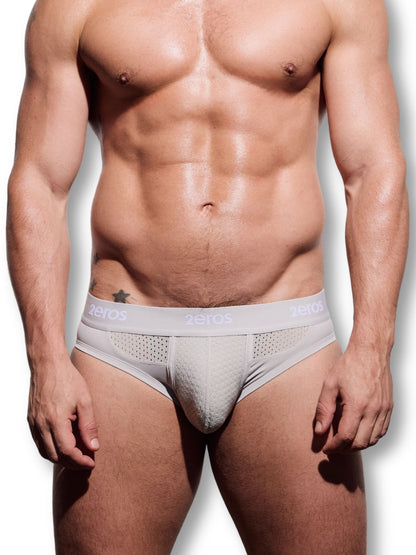 Man wearing a grey men's underwear on a white background