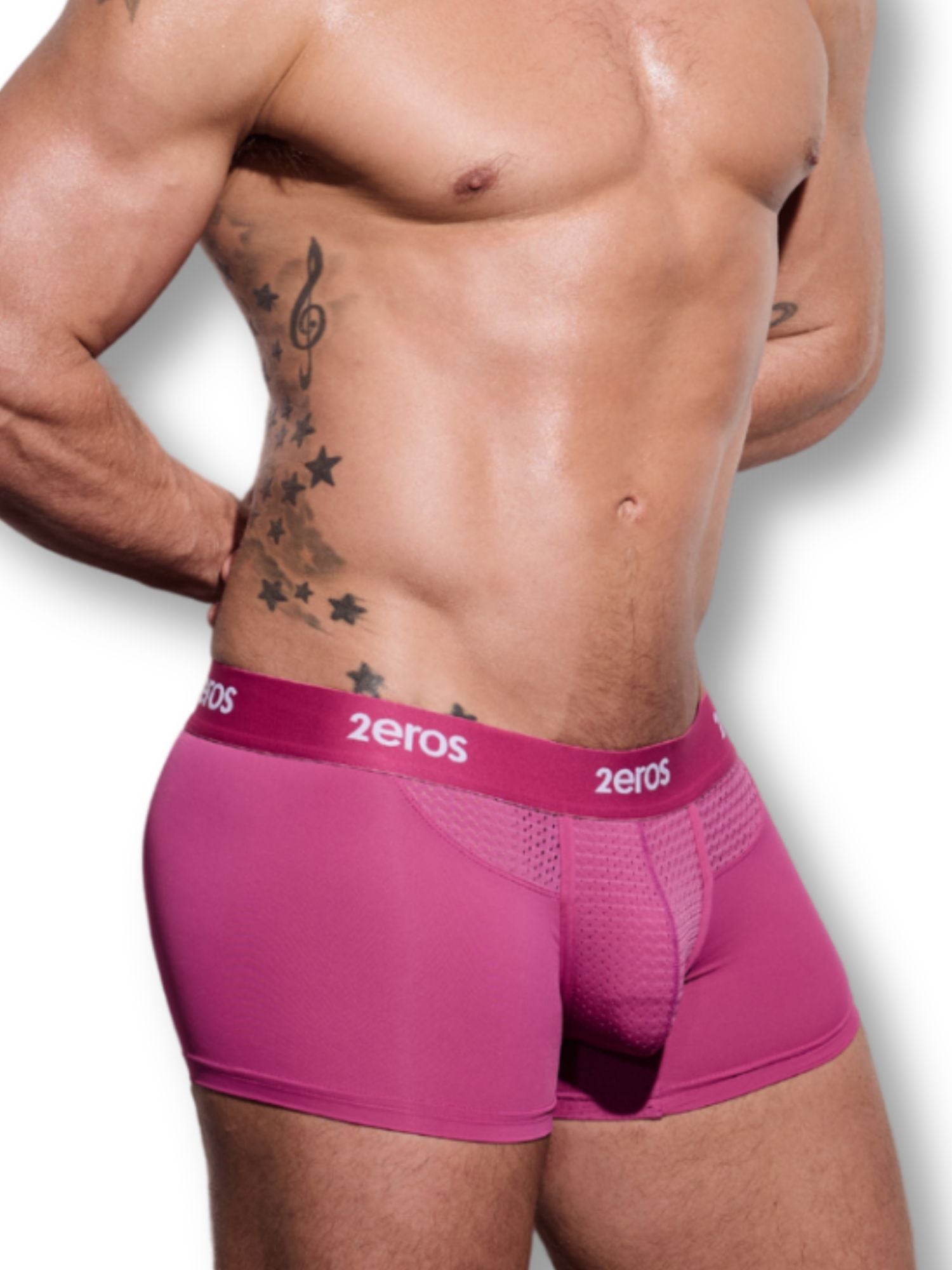 Person wearing pink underwear with '2eros' brand logo on a white background
