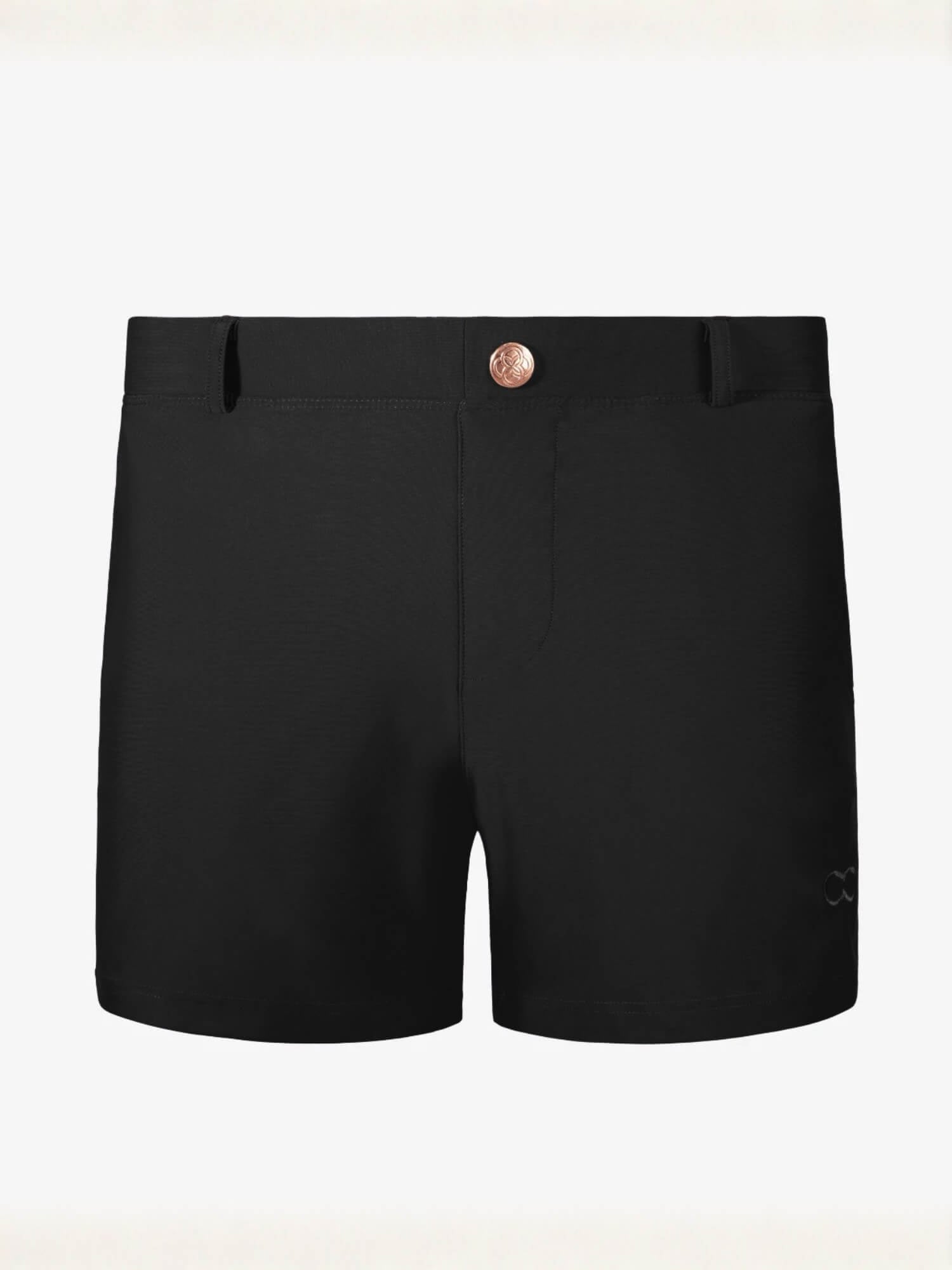 Black athletic shorts with a single rose gold button at the center waistband, displayed flat against a light off-white background.