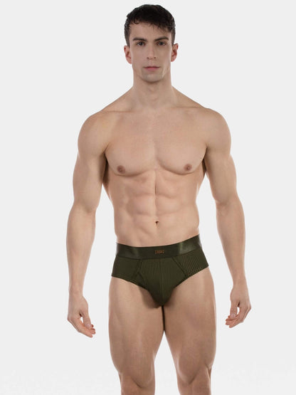 Man wearing a green underwear on a white background