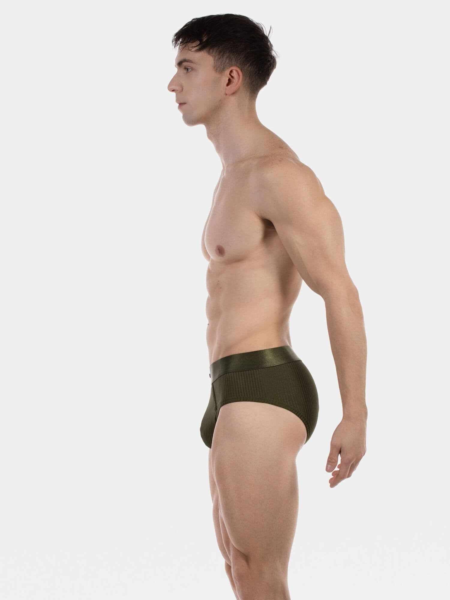 Man wearing a green swimsuit on a white background