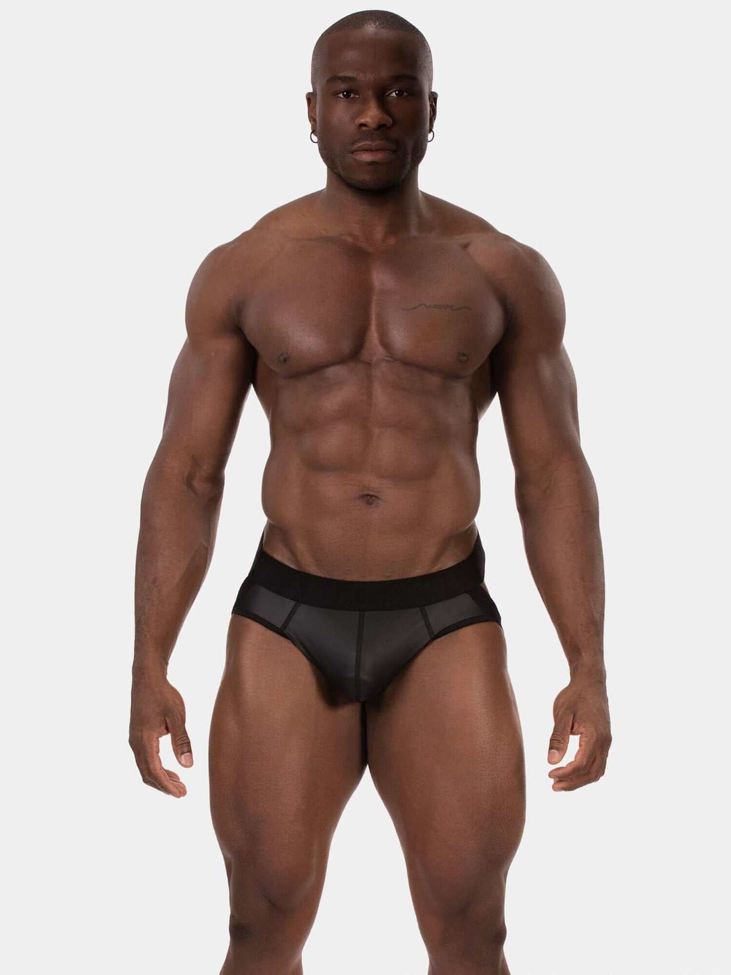 Man wearing a black underwear on a white background