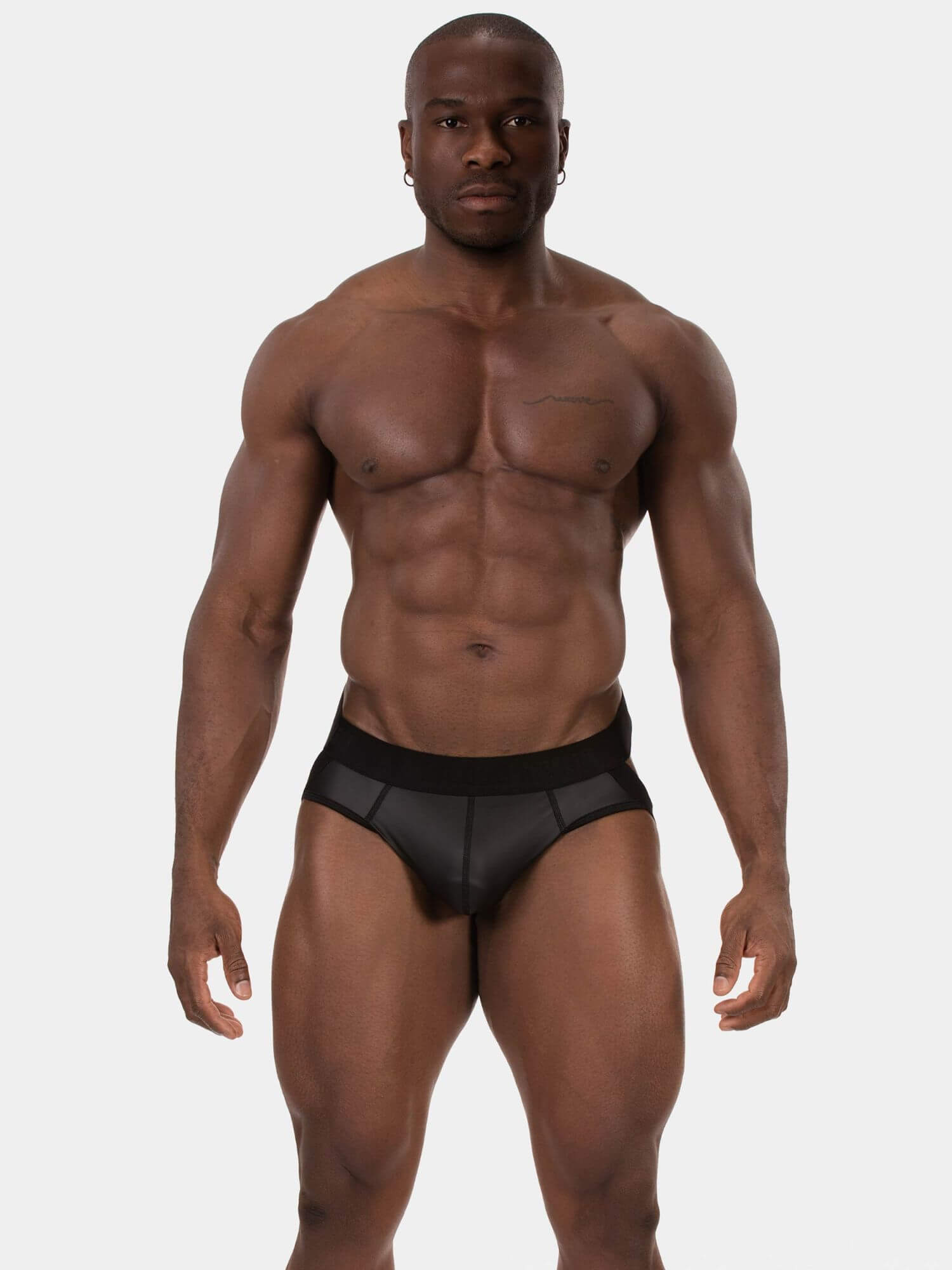 Man wearing a black underwear on a white background