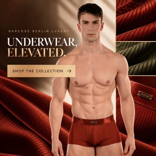 A shirtless male model wearing ribbed red underwear stands against a luxury promotional background with large text reading 'UNDERWEAR, ELEVATED.' and fabric close-ups showing red, green, and brown options.